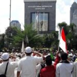 NU-Logo so bearbeitet, dass es wie ein jüdisches Symbol aussieht, Polizei greift ein